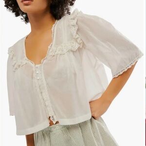 Free People “Luna Ruffle Cropped Blouse”